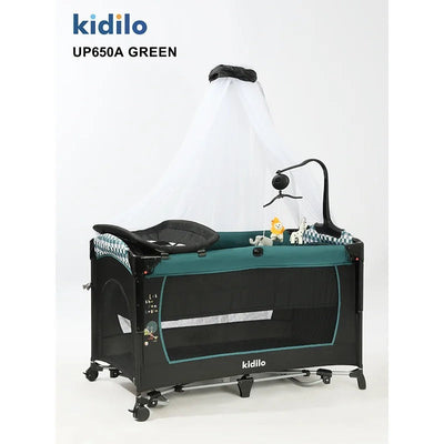 Kidilo UP650A travel cot in dark green with mesh sides, white mosquito net and overhead toys.