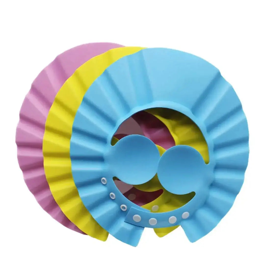 427-7: Stacked blue, yellow and pink shower visors showing adjustable snap fasteners.