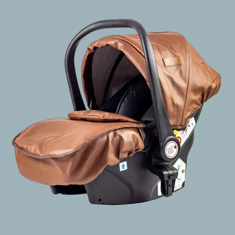 Brown Lucid SENA infant car seat with canopy, carry handle and leg cover