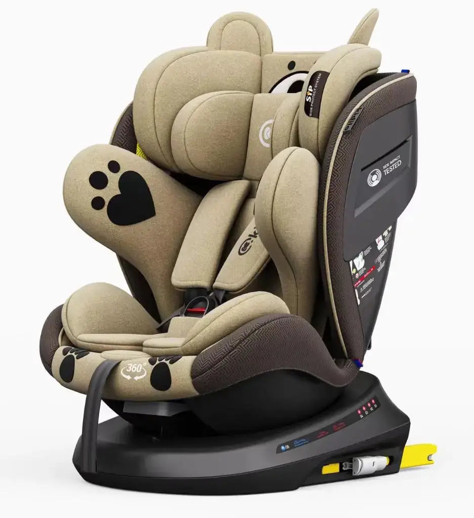 Kidilo 946: beige and brown car seat three-quarter view with padded headrest, harness and yellow ISOFIX connectors.