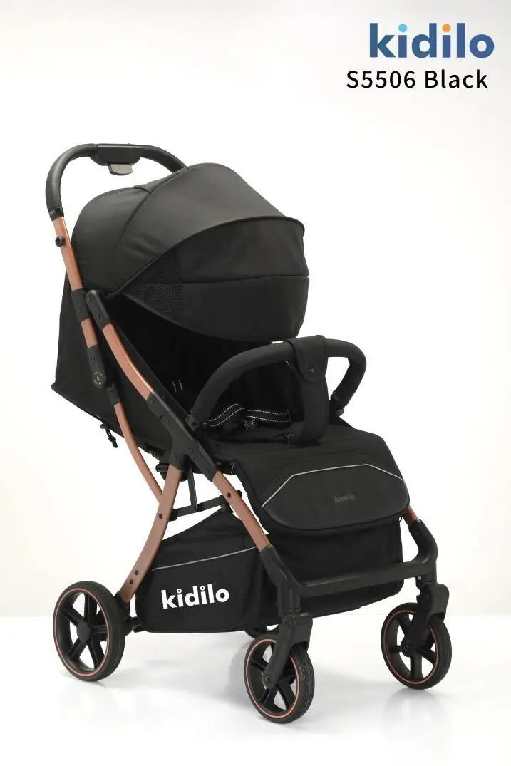 Kidilo S5506: Black stroller in three-quarter view with canopy, front bar and copper-toned frame.