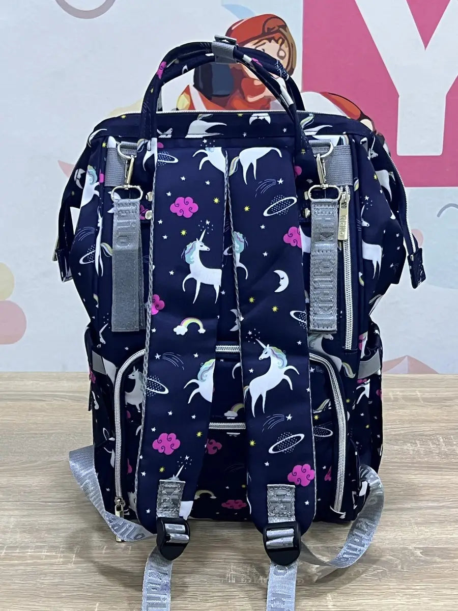 Kidilo Unicorn-Print: navy rear view on wooden table showing grey hanging loops.