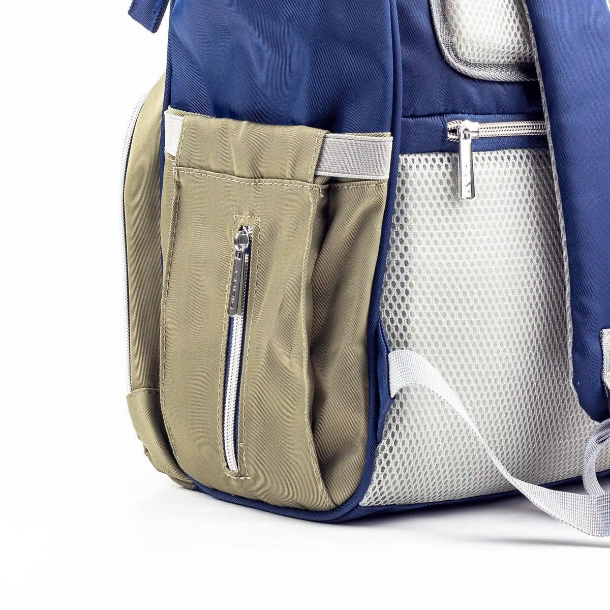 Lucid diaper backpack – close-up of olive side pocket beside grey mesh padding