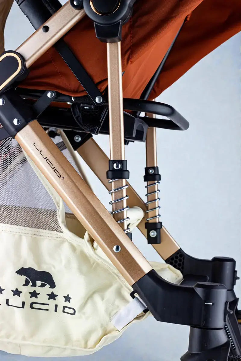 Lucid Easy Go LC2: Close-up of frame spring and fabric storage basket
