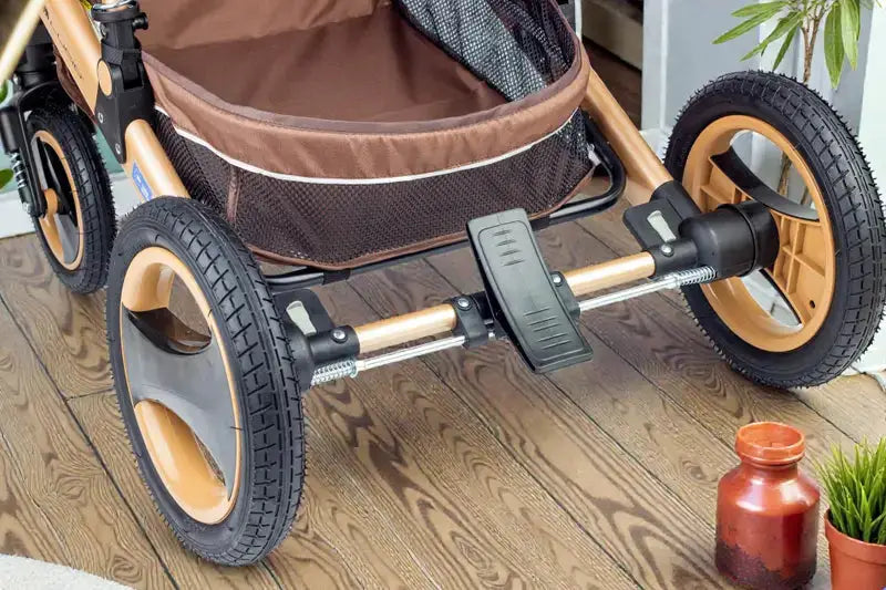 Lucid SENA PLUS LC3: Rear axle and brake assembly beneath brown stroller seat