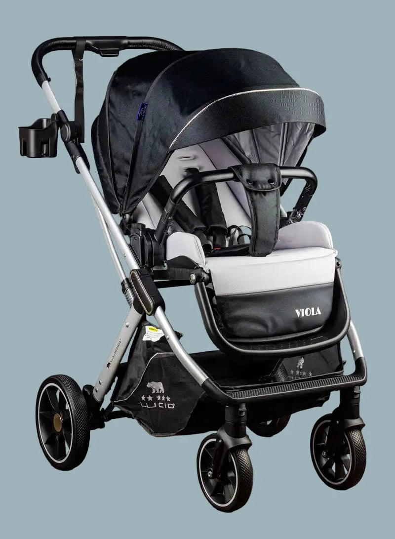 Lucid VIOLA LC8: Black carriage stroller with silver frame and leg cover, angled view