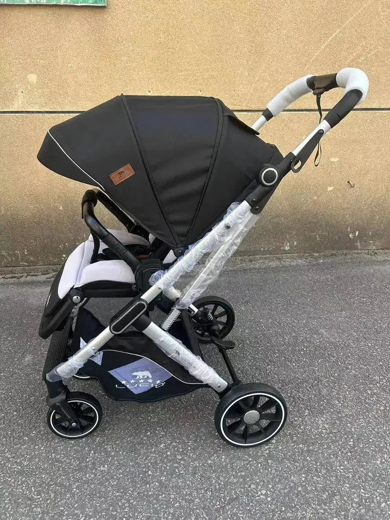 Lucid VIOLA LC8: Black stroller showing full side profile outdoors