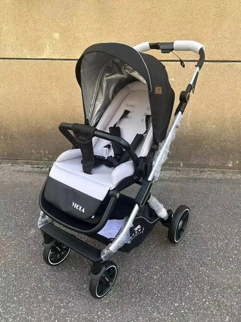 Lucid VIOLA LC8: Black stroller showing padded seat and front leg cover