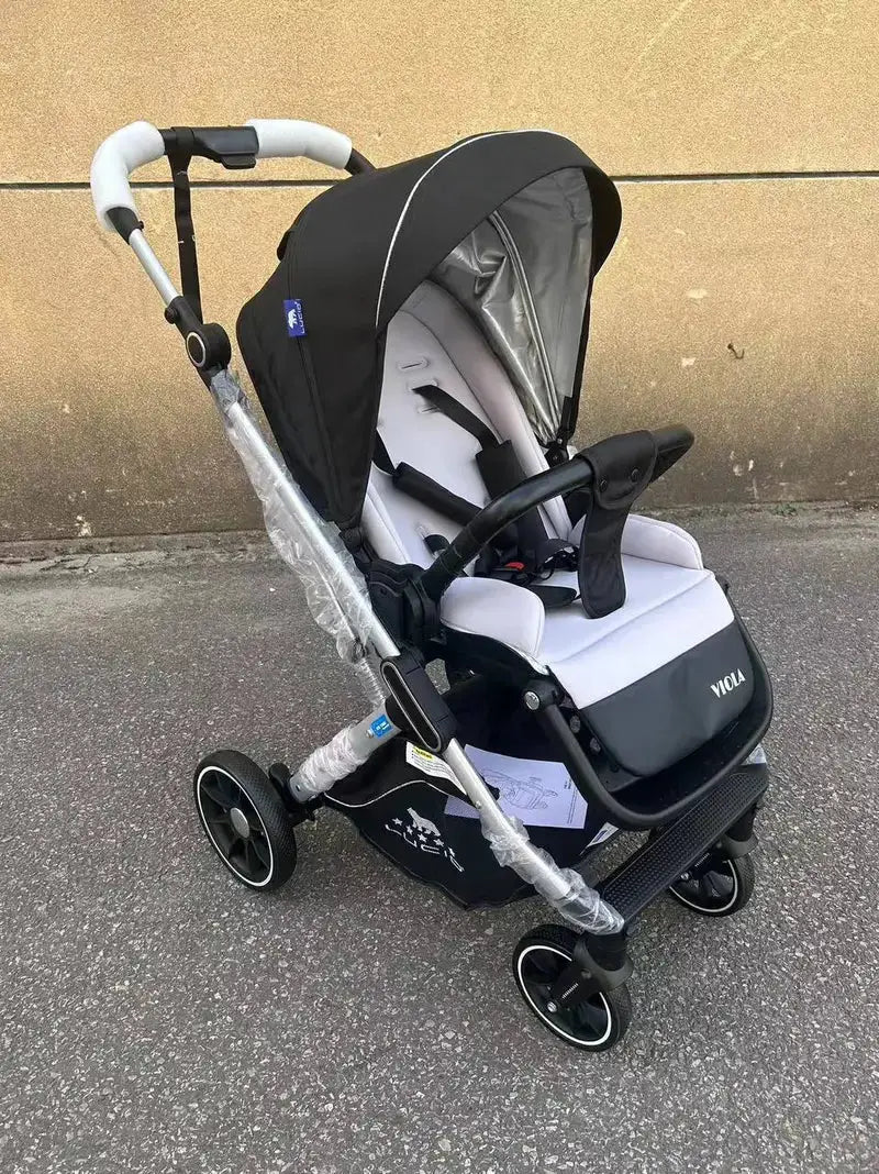 Lucid VIOLA LC8: Black stroller with canopy retracted and light padded seat visible