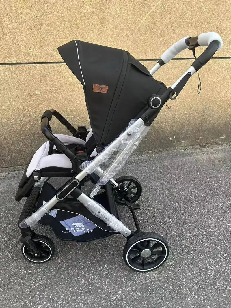 Lucid VIOLA LC8: Black stroller with grey seat insert and raised handle, side view