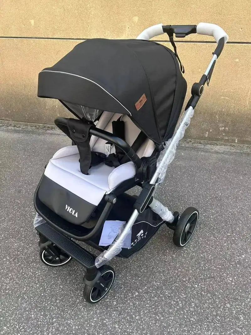 Lucid VIOLA LC8: Black stroller with wide canopy and grey insert, front angle