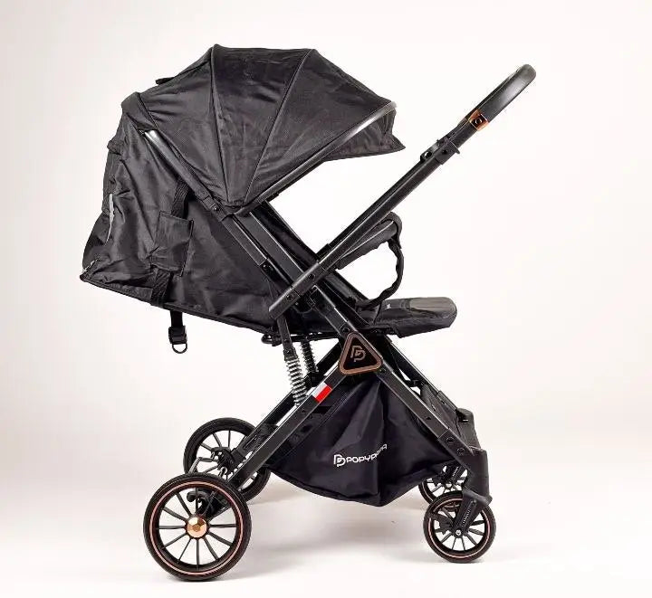 Popypapa H1: black stroller side view with extended canopy and lower basket.
